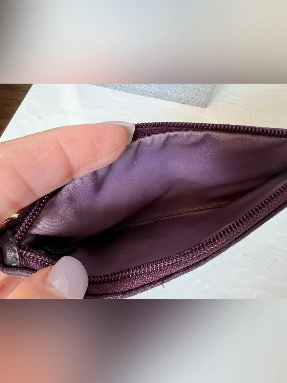 Purple jacquard Coach wristlet